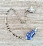 Natural Gemstone Smooth Conical Crystal Pendulum with Mystery Charm | Bag Charm - New Age Realms