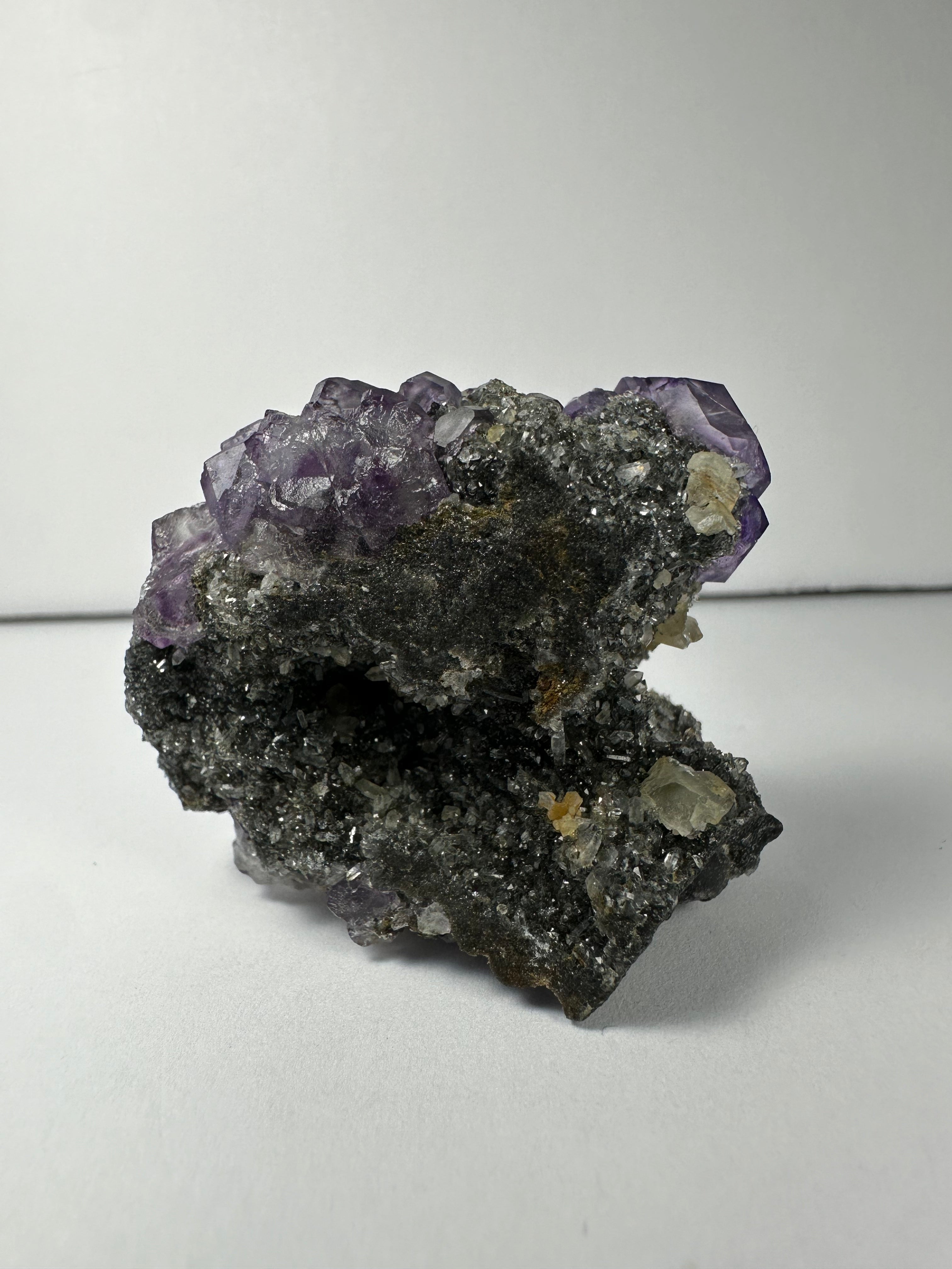 Purple Dodecahedral Fluorite with Calcite on matrix - New Age Realms