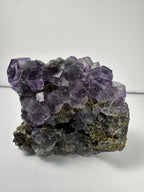 Purple Dodecahedral Fluorite with Calcite on matrix - New Age Realms