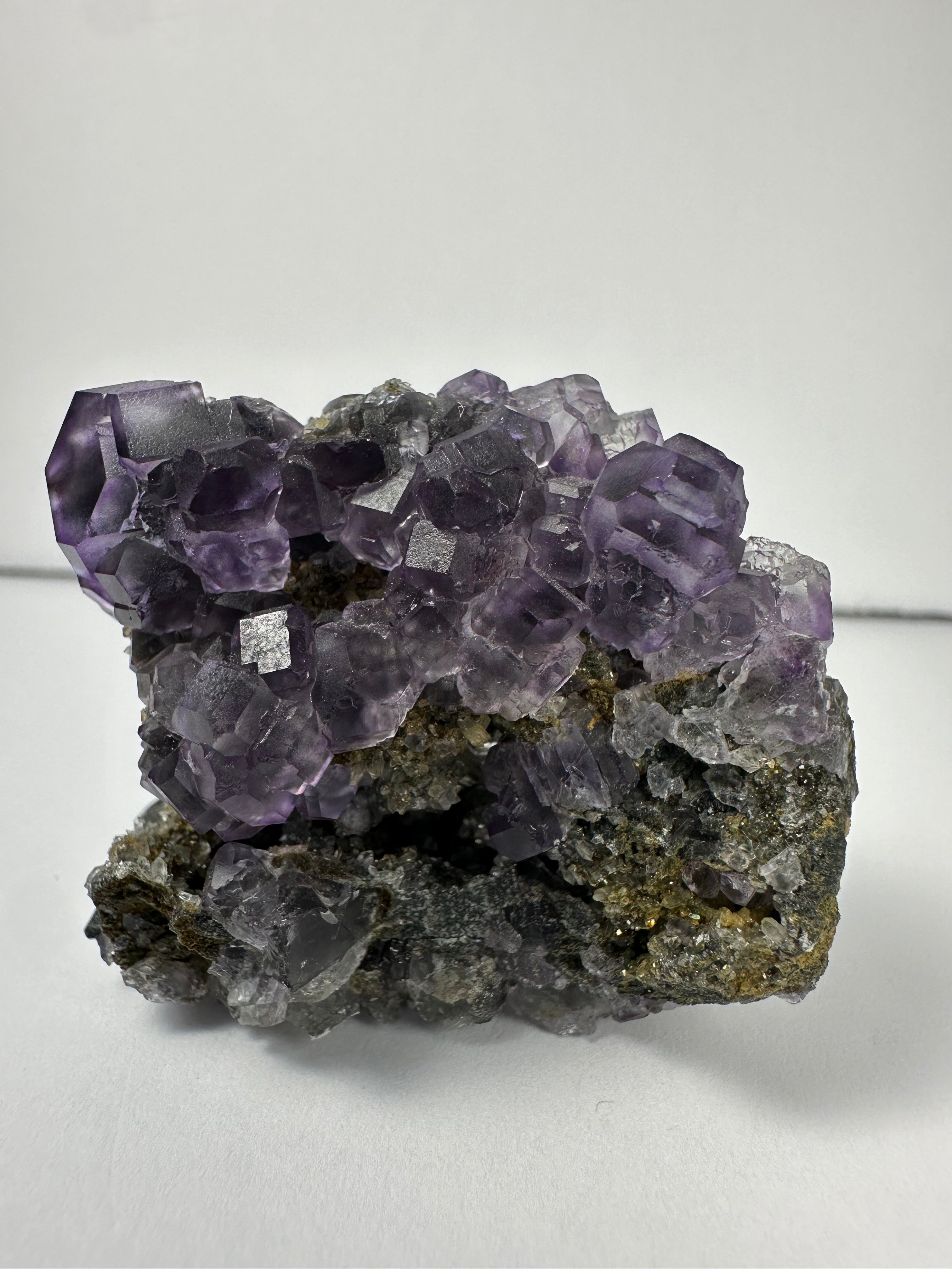 Purple Dodecahedral Fluorite with Calcite on matrix - New Age Realms