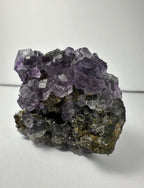 Purple Dodecahedral Fluorite with Calcite on matrix - New Age Realms