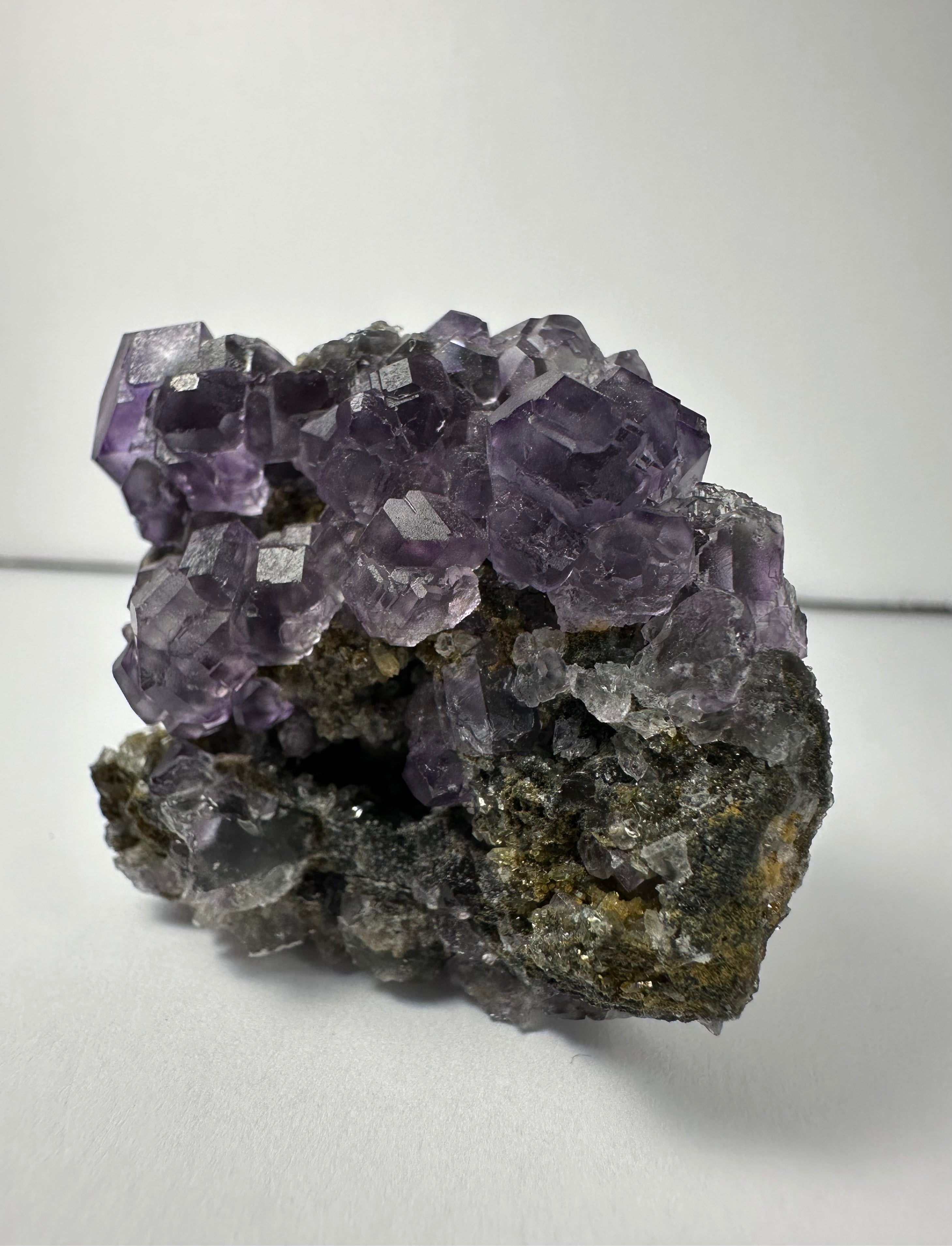 Purple Dodecahedral Fluorite with Calcite on matrix - New Age Realms