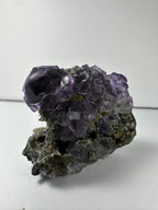 Purple Dodecahedral Fluorite with Calcite on matrix - New Age Realms