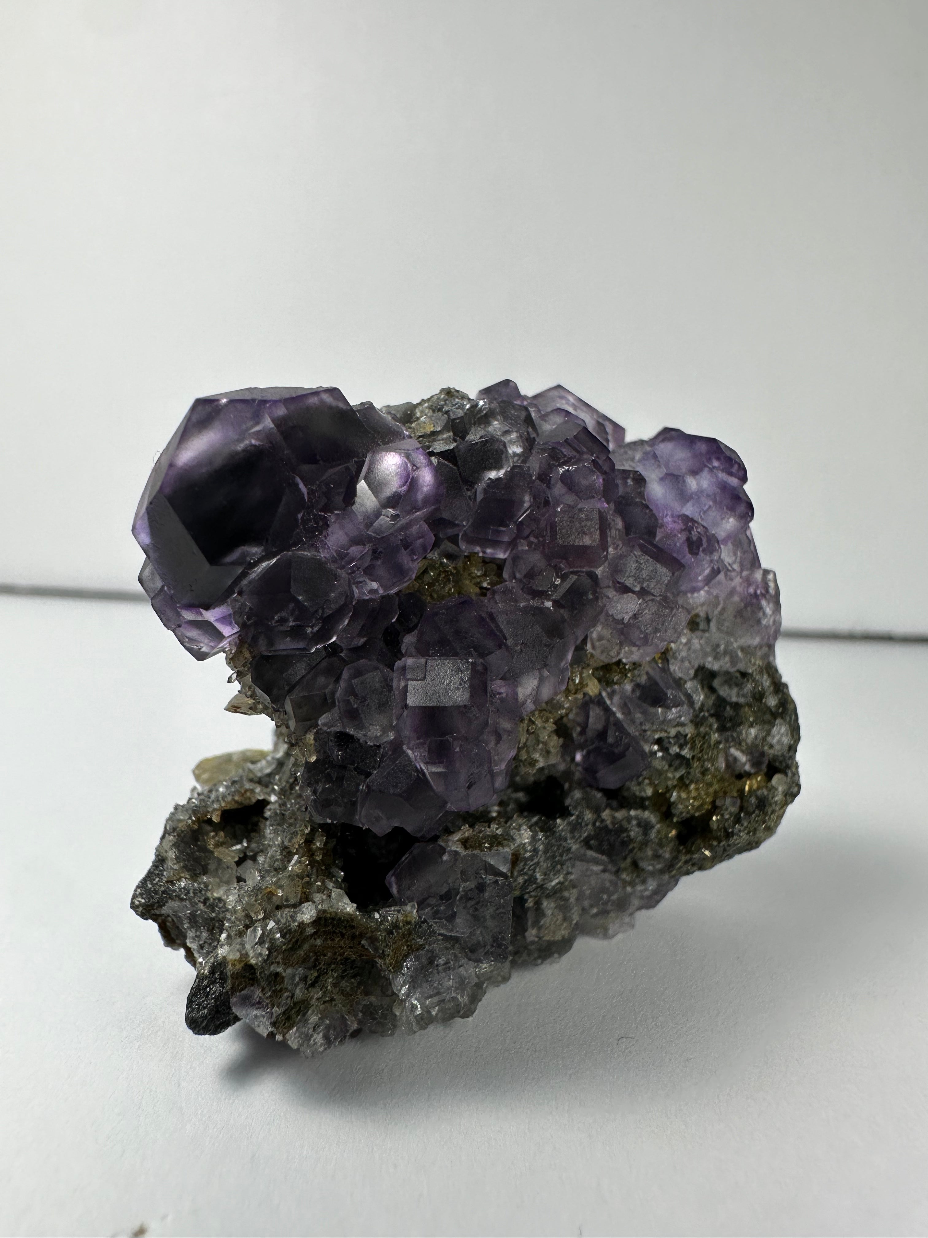 Purple Dodecahedral Fluorite with Calcite on matrix - New Age Realms