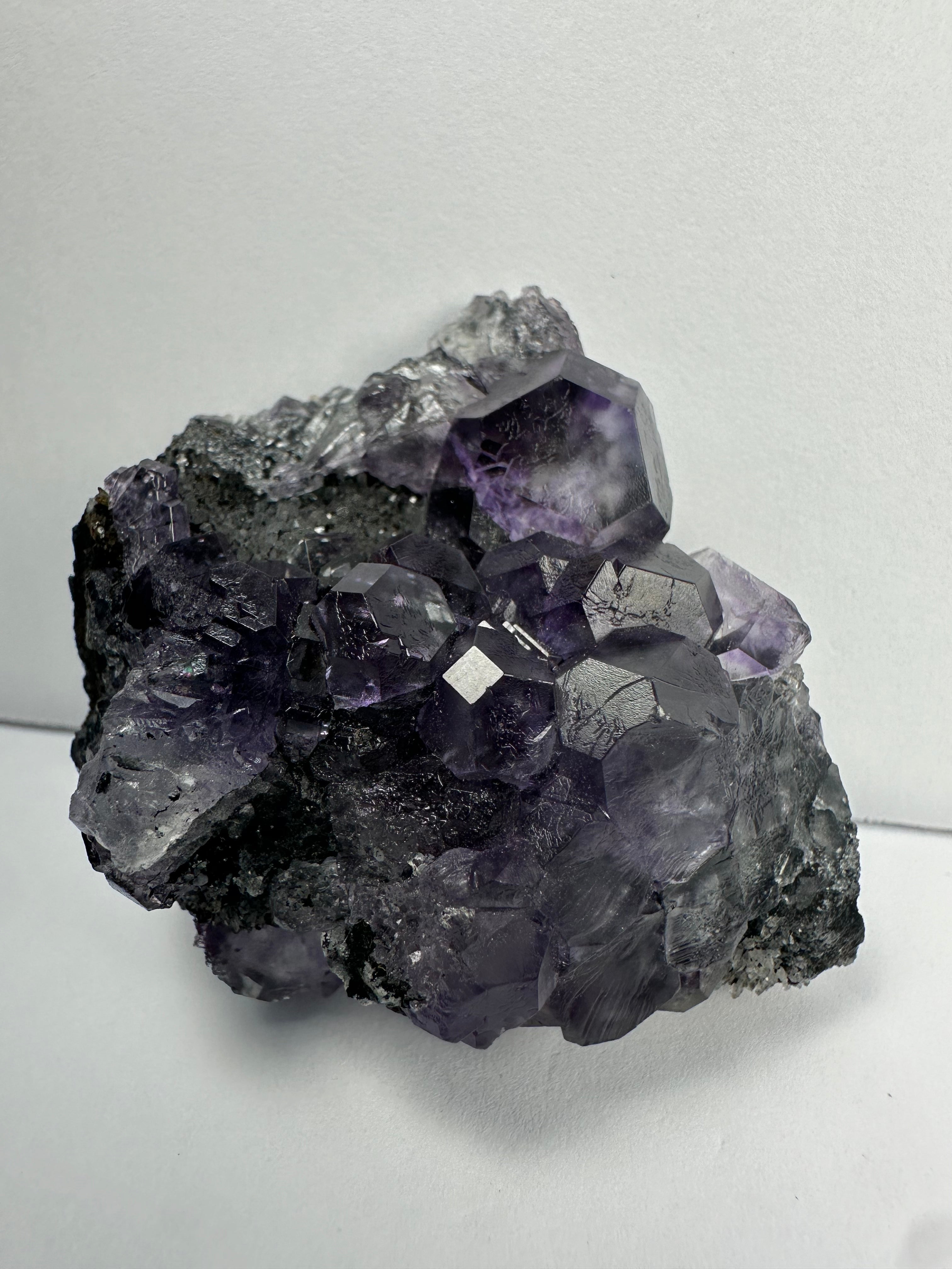 Purple Dodecahedral Fluorite with Calcite on matrix - New Age Realms