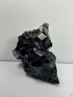 Purple Dodecahedral Fluorite with Calcite on matrix - New Age Realms