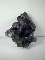 Purple Dodecahedral Fluorite with Calcite on matrix - New Age Realms