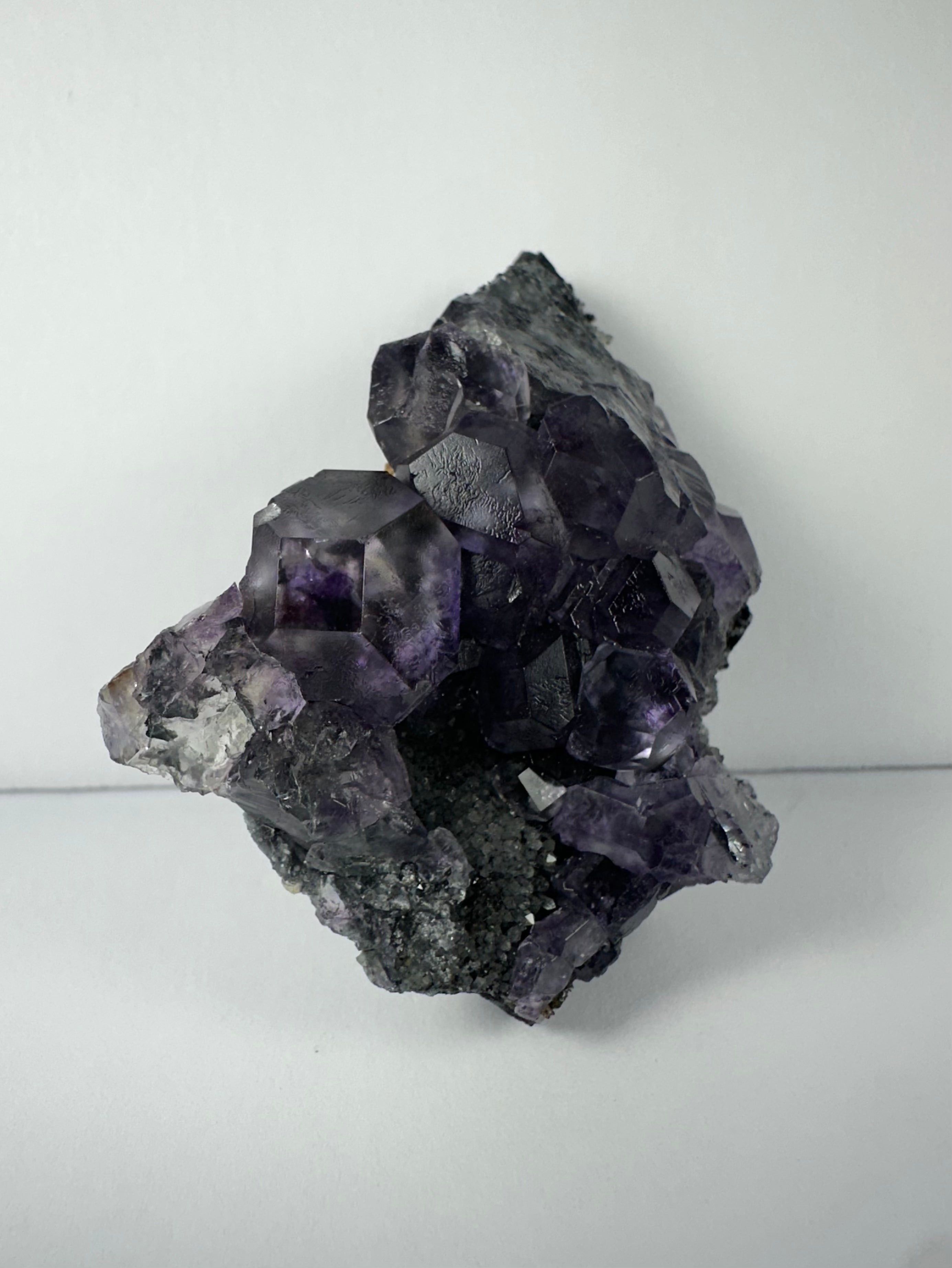 Purple Dodecahedral Fluorite with Calcite on matrix - New Age Realms