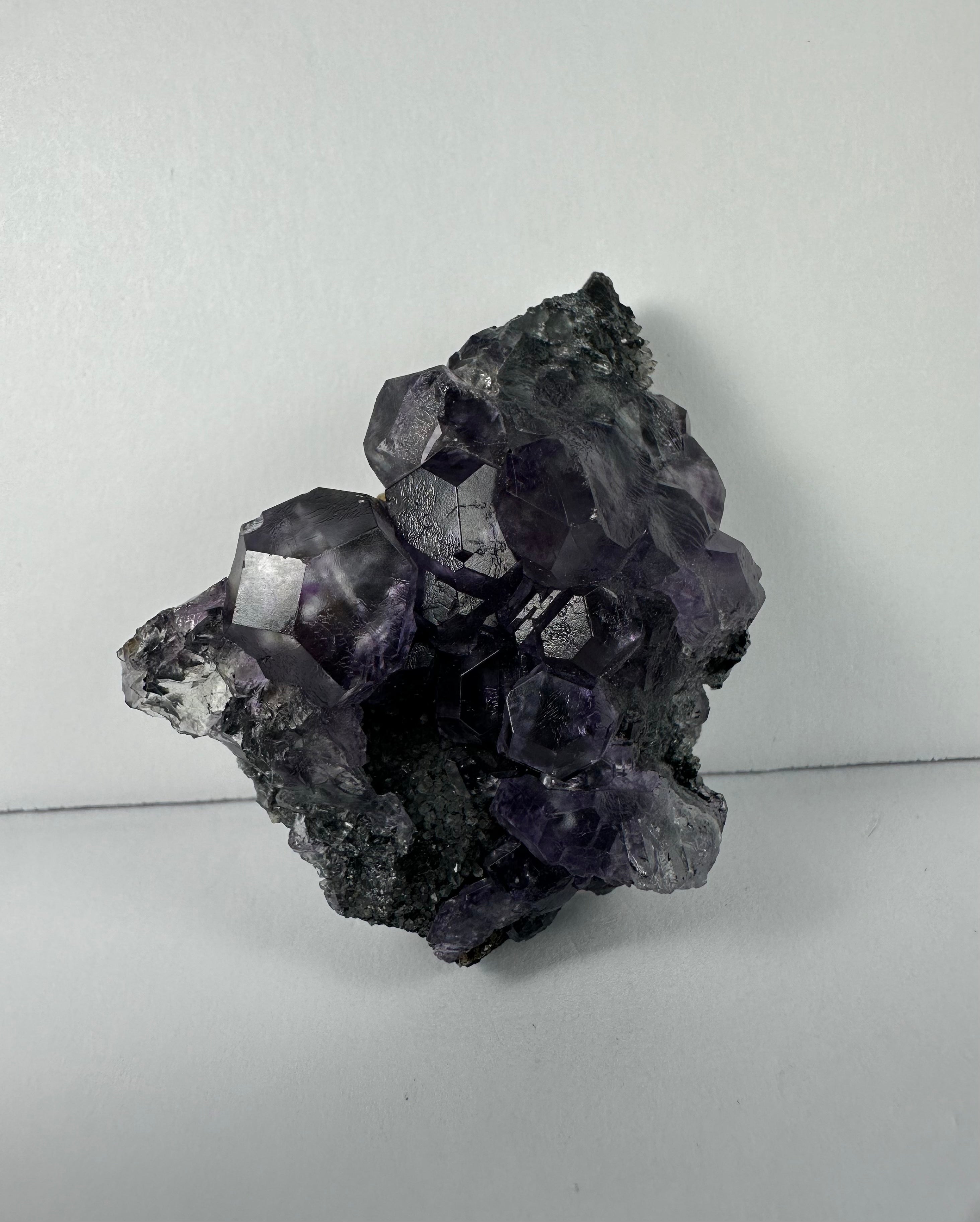Purple Dodecahedral Fluorite with Calcite on matrix - New Age Realms
