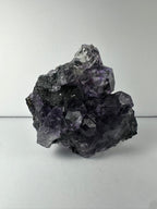 Purple Dodecahedral Fluorite with Calcite on matrix - New Age Realms