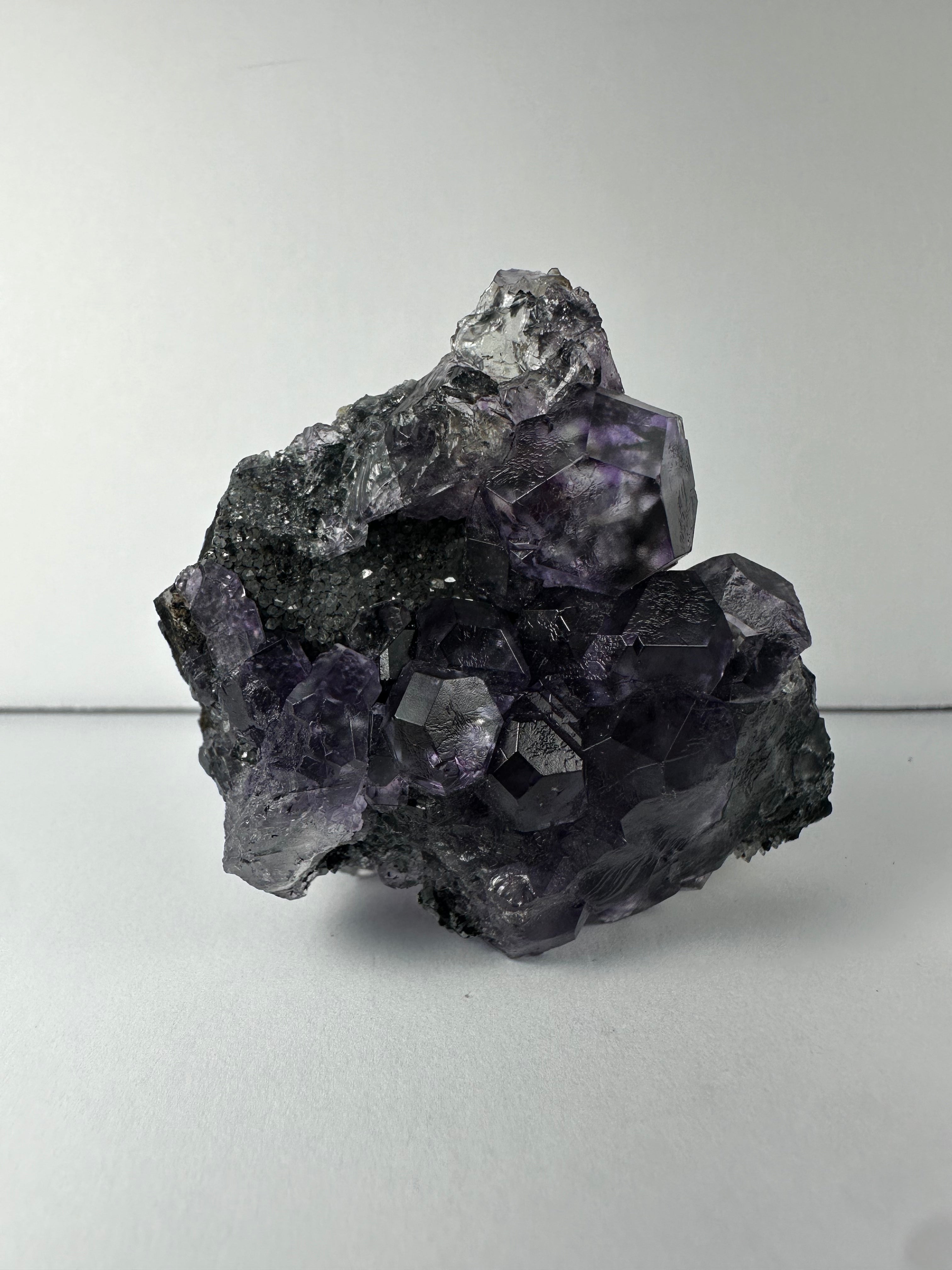 Purple Dodecahedral Fluorite with Calcite on matrix - New Age Realms